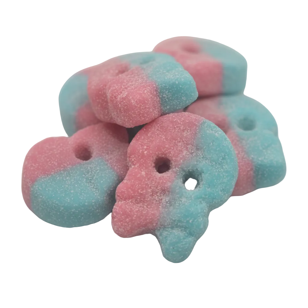 A pile of sugar-dusted, two-tone skull-shaped candies in pink and light blue, with a 'D&G Sweetzone' logo in the bottom right corner on a plain white background.